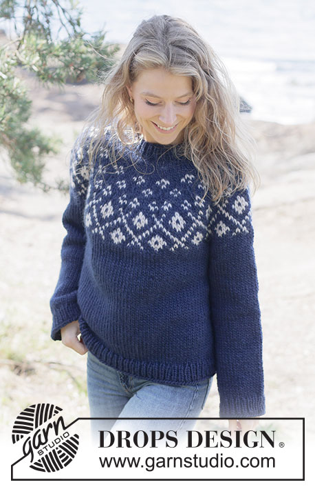 Midnight Flowers Sweater / DROPS 263-2 - Gebreide trui in DROPS Snow. Het werk wordt van boven naar beneden gebreid met ronde pas en gekleurd patroon. Maten XS - XXXL.