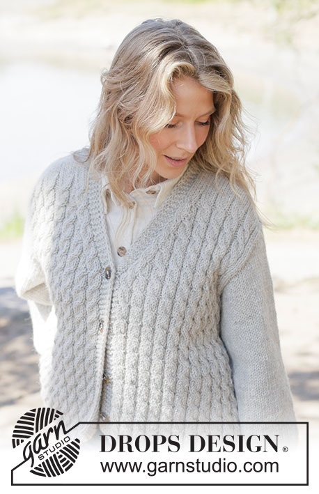 Soft Spire Cardigan / DROPS 263-27 - Knitted jacket in DROPS Nepal. The piece is worked bottom up with cables, V-neck and diagonal shoulders. Sizes XS - XXXL.