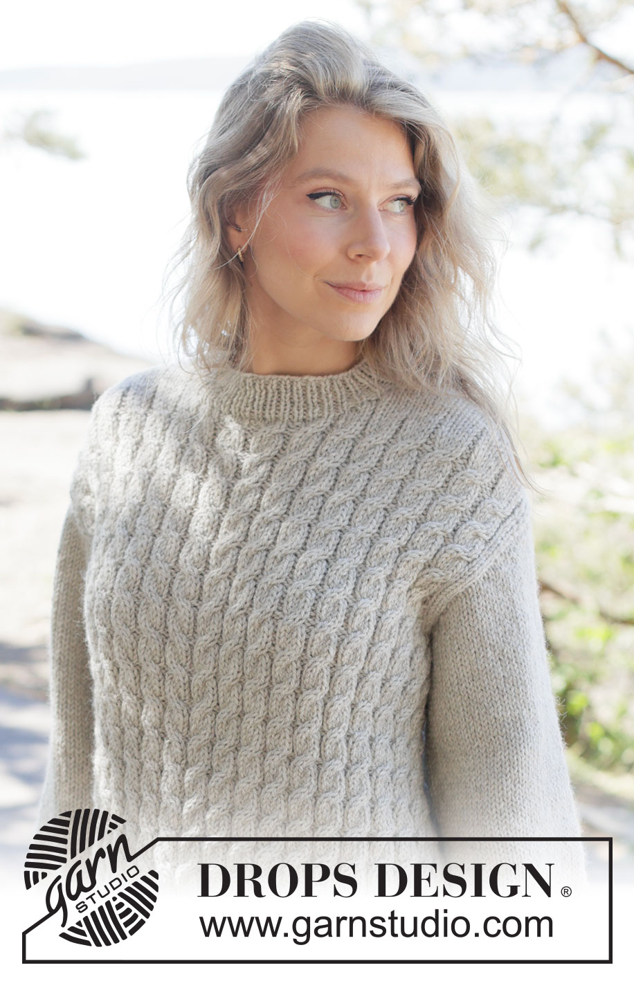 Soft Spire Sweater / DROPS 263-28 - Knitted jumper in DROPS Nepal. The piece is worked bottom up with cables and diagonal shoulders. Sizes XS - XXXL.