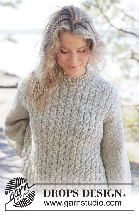 Soft Spire Sweater / DROPS 263-28 - Knitted jumper in DROPS Nepal. The piece is worked bottom up with cables and diagonal shoulders. Sizes XS - XXXL.