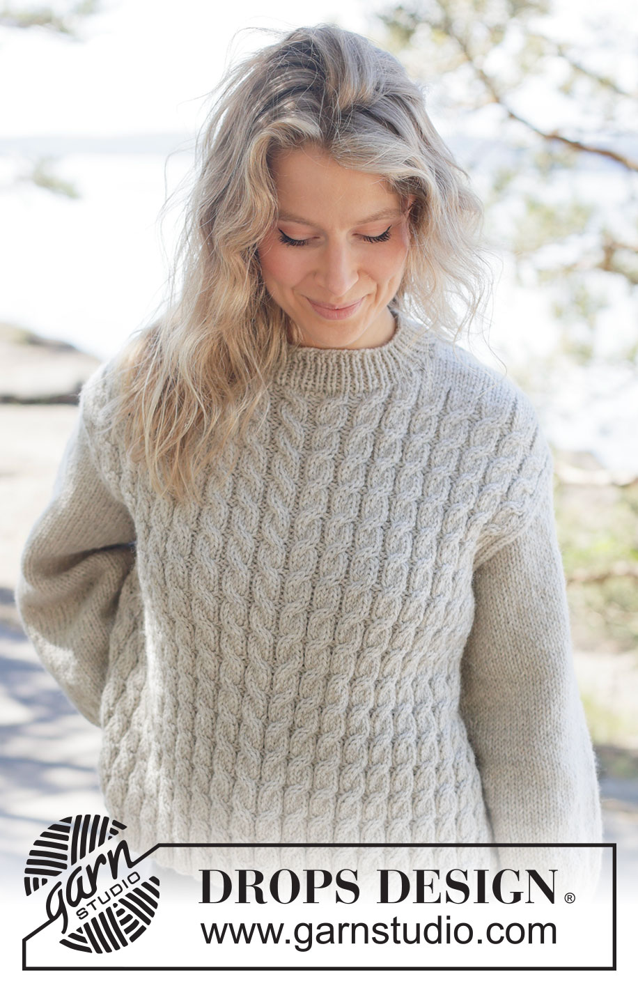 Soft Spire Sweater / DROPS 263-28 - Knitted jumper in DROPS Nepal. The piece is worked bottom up with cables and diagonal shoulders. Sizes XS - XXXL.