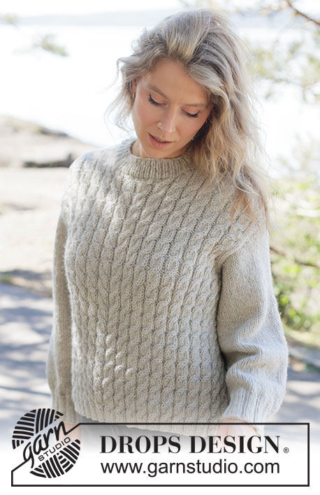 Soft Spire Sweater / DROPS 263-28 - Knitted jumper in DROPS Nepal. The piece is worked bottom up with cables and diagonal shoulders. Sizes XS - XXXL.