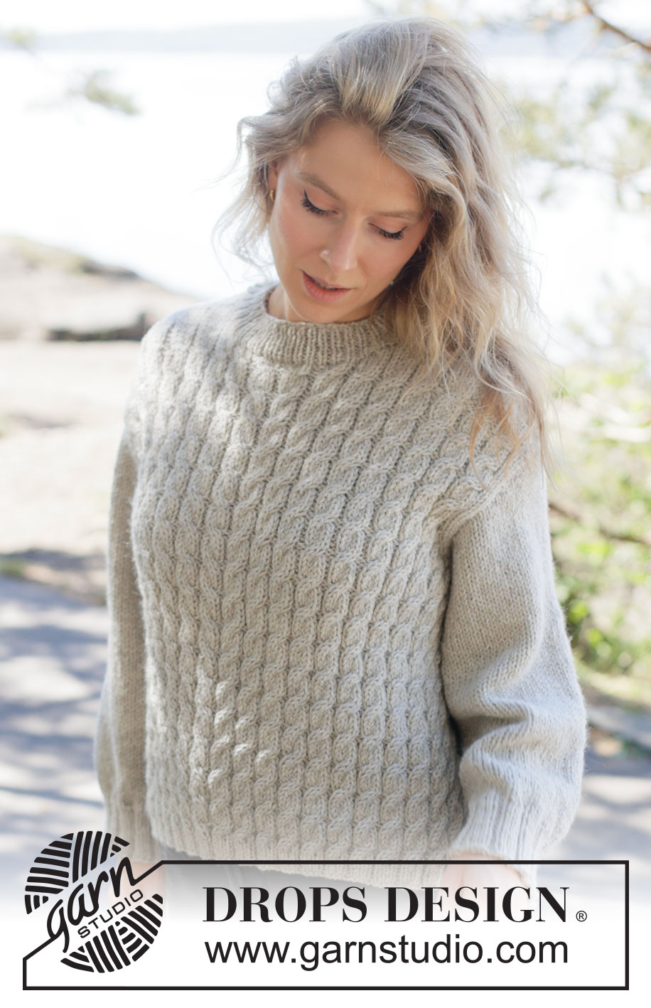 Soft Spire Sweater / DROPS 263-28 - Knitted jumper in DROPS Nepal. The piece is worked bottom up with cables and diagonal shoulders. Sizes XS - XXXL.