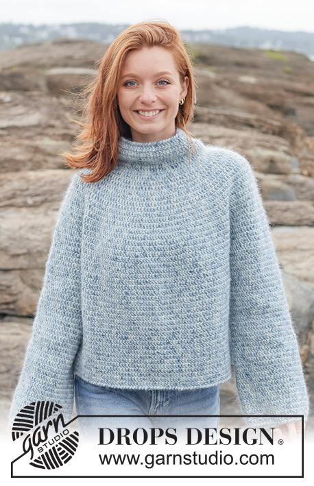 Ocean Whisper / DROPS 263-31 - Pulovr s kruhovým sedlem a račími sloupky háčkovaný shora dolů z přízí DROPS Fiesta a DROPS Kid-Silk. Velikosti: XS - XXXL.