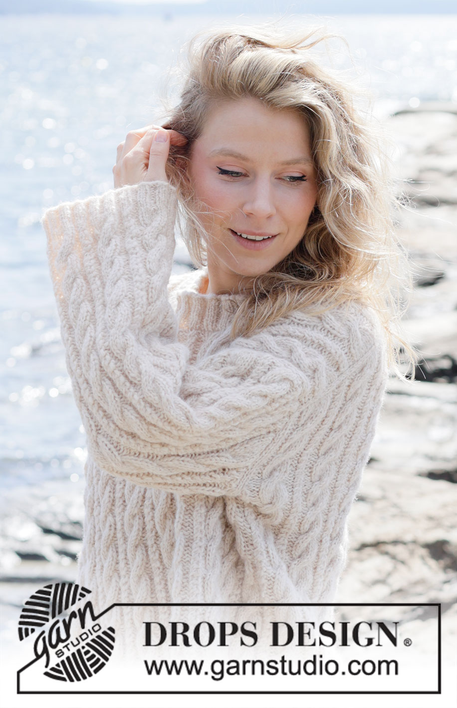 Winter Sketch Sweater / DROPS 264-1 - Knitted sweater in DROPS Air. The piece is worked top down with European/diagonal shoulders and cables. Sizes XS - XXXL.