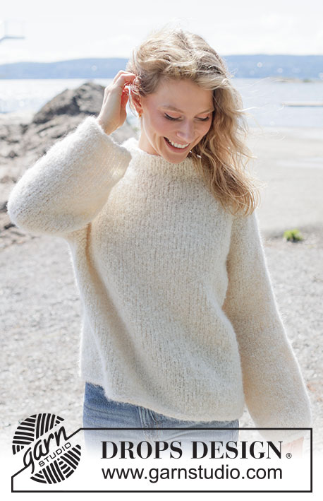 Frost Bloom Sweater / DROPS 264-23 - Gestrickter Pullover in DROPS Alpaca Bouclé und DROPS Brushed Alpaca Silk. Die Arbeit wird glatt rechts von oben nach unten mit Raglan, Ballonärmeln und I-Cord gestrickt. Größe XS - XXXL.