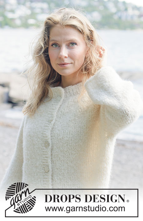 Frost Bloom Cardigan / DROPS 264-24 - Gestrickte Jacke in DROPS Alpaca Bouclé und DROPS Brushed Alpaca Silk. Die Arbeit wird glatt rechts von oben nach unten mit Raglan, Ballonärmeln und I-Cord gestrickt. Größe XS - XXXL.