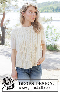 Vanilla Meringue Vest / DROPS 264-29 - Knitted vest in DROPS Alaska or DROPS Big Merino. The piece is worked bottom up with cables, moss stitch and ribbed edges. Sizes XS - XXXL.