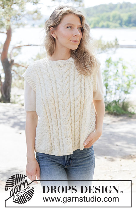 Vanilla Meringue Vest / DROPS 264-29 - Knitted vest in DROPS Alaska or DROPS Big Merino. The piece is worked bottom up with cables, moss stitch and ribbed edges. Sizes XS - XXXL.