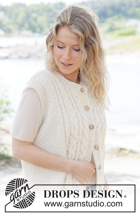 Vanilla Meringue / DROPS 264-30 - Gilet lavorato ai ferri in DROPS Alaska o DROPS Big Merino. Lavorato dal basso verso l’alto a trecce, grana di riso, I-cord e bordi. Taglie: XS - XXXL.