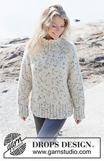 Winter Sprinkles Sweater / DROPS 264-8 - Maglione lavorato ai ferri in DROPS Snow. Lavorato dall’alto in basso a maglia rasata con raglan, spacchi laterali e collo alto. Taglie: XS - XXXL.