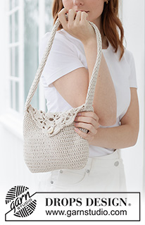 Treasure Keeper Bag / DROPS 265-11 - Heklet liten veske i DROPS Muskat. Arbeidet hekles ovenfra og ned i staver med viftemønster på klaffen.