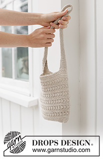 Cream Breeze Bag / DROPS 265-13 - Heklet liten veske i DROPS Bomull-Lin. Arbeidet hekles rundt nedenfra og opp med stjernemønster.