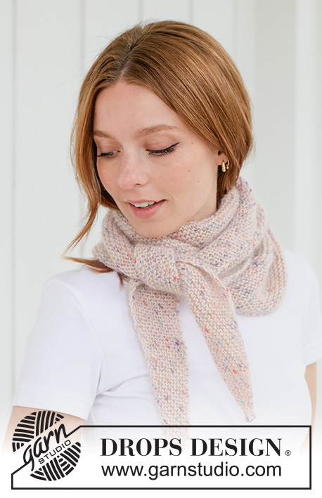 Candy Sprinkles Shawl / DROPS 265-16 - Knitted shawl in DROPS Baby Merino and DROPS Kid-Silk. The piece is worked diagonally in garter stitch.