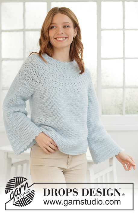 Blue Petal Sweater / DROPS 266-24 - Ylhäältä alas virkattu pusero DROPS Air-langasta. Työssä on pylväitä ja nirkkoreunukset. Kaarrokkeessa on pitsikuvioita. Koot XS - XXXL.