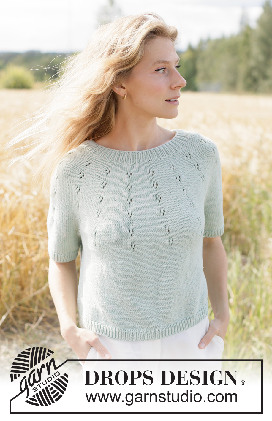 Mint Halo Sweater / DROPS 266-33 - Knitted jumper in DROPS Cotton Merino or DROPS Belle. The piece is worked top down with round yoke, lace pattern on the yoke and short sleeves. Sizes XS - XXXL.