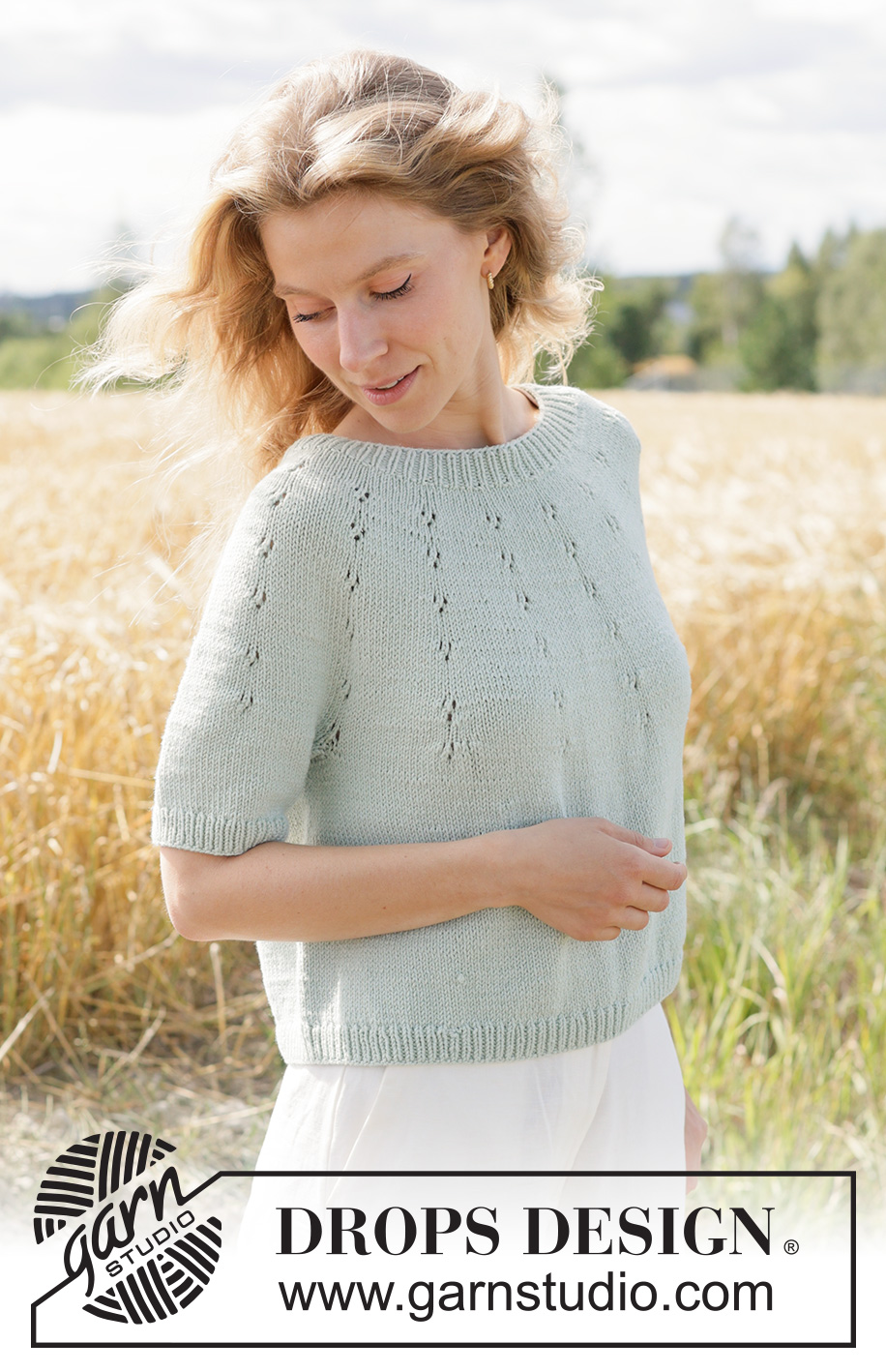 Mint Halo Sweater / DROPS 266-33 - Knitted jumper in DROPS Cotton Merino or DROPS Belle. The piece is worked top down with round yoke, lace pattern on the yoke and short sleeves. Sizes XS - XXXL.