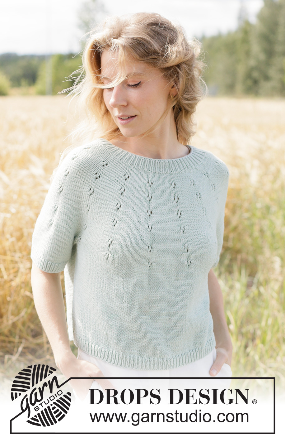 Mint Halo Sweater / DROPS 266-33 - Knitted jumper in DROPS Cotton Merino or DROPS Belle. The piece is worked top down with round yoke, lace pattern on the yoke and short sleeves. Sizes XS - XXXL.