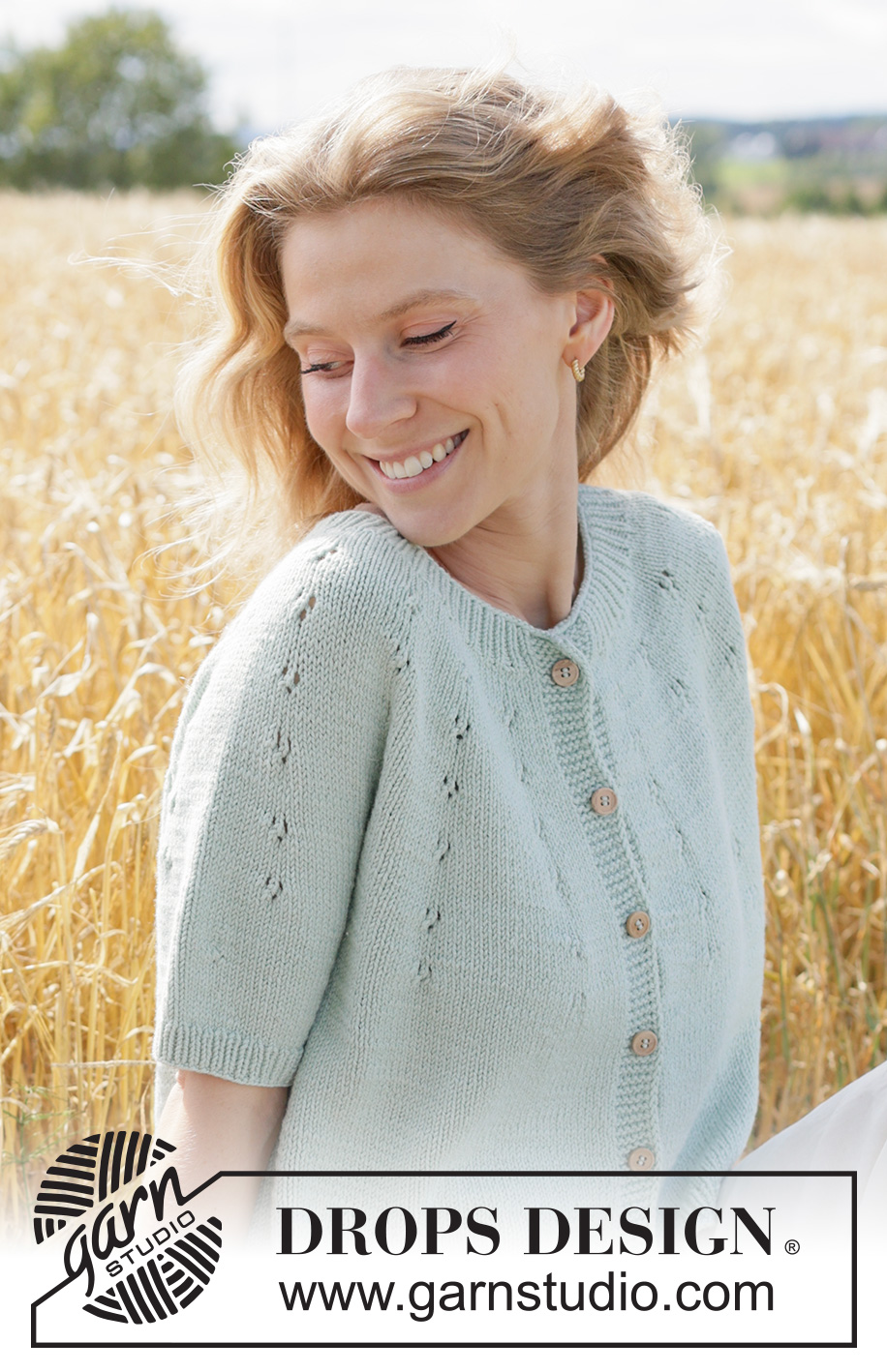 Mint Halo Cardigan / DROPS 266-34 - Knitted jacket in DROPS Cotton Merino or DROPS Belle. The piece is worked top down with round yoke, lace pattern on the yoke, I-cord and short sleeves. Sizes XS - XXXL.