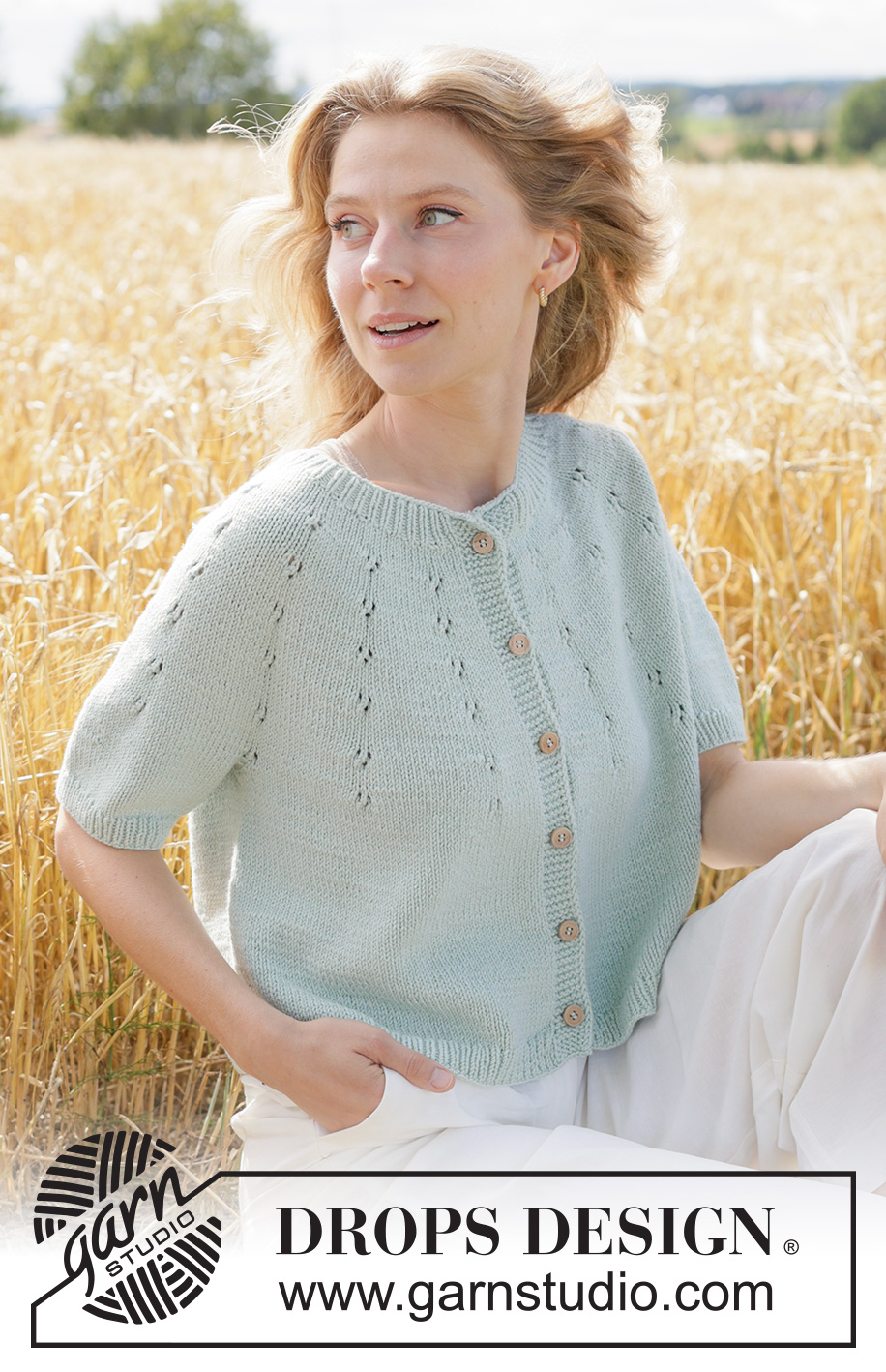 Mint Halo Cardigan / DROPS 266-34 - Knitted jacket in DROPS Cotton Merino or DROPS Belle. The piece is worked top down with round yoke, lace pattern on the yoke, I-cord and short sleeves. Sizes XS - XXXL.