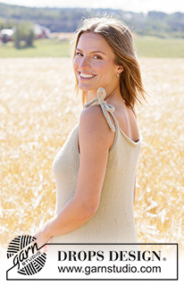 Breezy Oats Dress / DROPS 266-38 - Prjónaður kjóll úr DROPS Paris. Stykkið er prjónað ofan frá og niður með böndum á öxlum, i-cord og pífu. Stærð XS - XXXL.