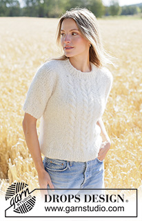 Barley Twist Sweater / DROPS 267-9 - Knitted jumper in DROPS Alpaca Bouclé and DROPS Kid-Silk. The piece is worked top down in stocking stitch with European yoke and cables. Sizes XS - XXXL.