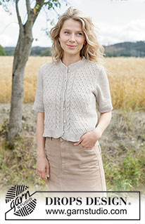 Crossing Sand Cardigan / DROPS 268-23 - Ylhäältä alas neulottu jakku DROPS Cotton Light -langasta. Työssä on lyhyet hihat, eurooppalainen kaarroke, palmikoita ja i-cord-reunukset. Koot XS-XXXL.