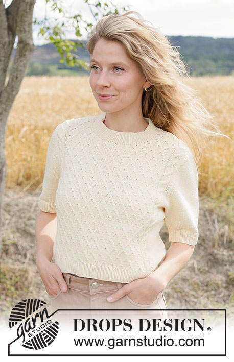 Sunlit Grid Top / DROPS 268-24 - Ylhäältä alas neulottu pusero DROPS Muskat-langasta. Työssä on lyhyet hihat, eurooppalainen kaarroke ja palmikoita. Koot XS - XXXL.