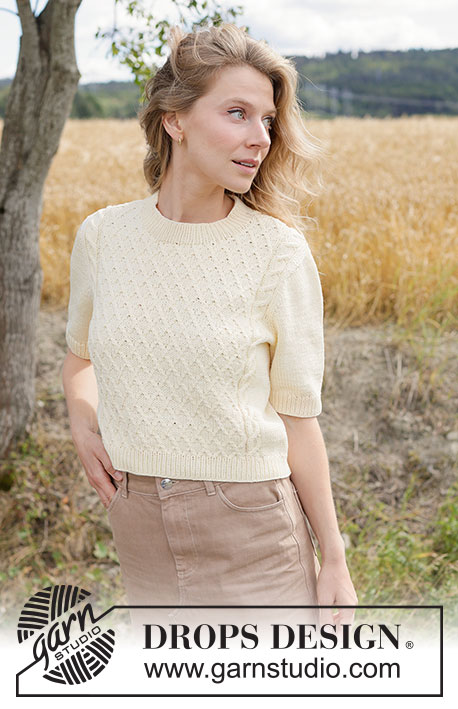 Sunlit Grid Top / DROPS 268-24 - Ylhäältä alas neulottu pusero DROPS Muskat-langasta. Työssä on lyhyet hihat, eurooppalainen kaarroke ja palmikoita. Koot XS - XXXL.