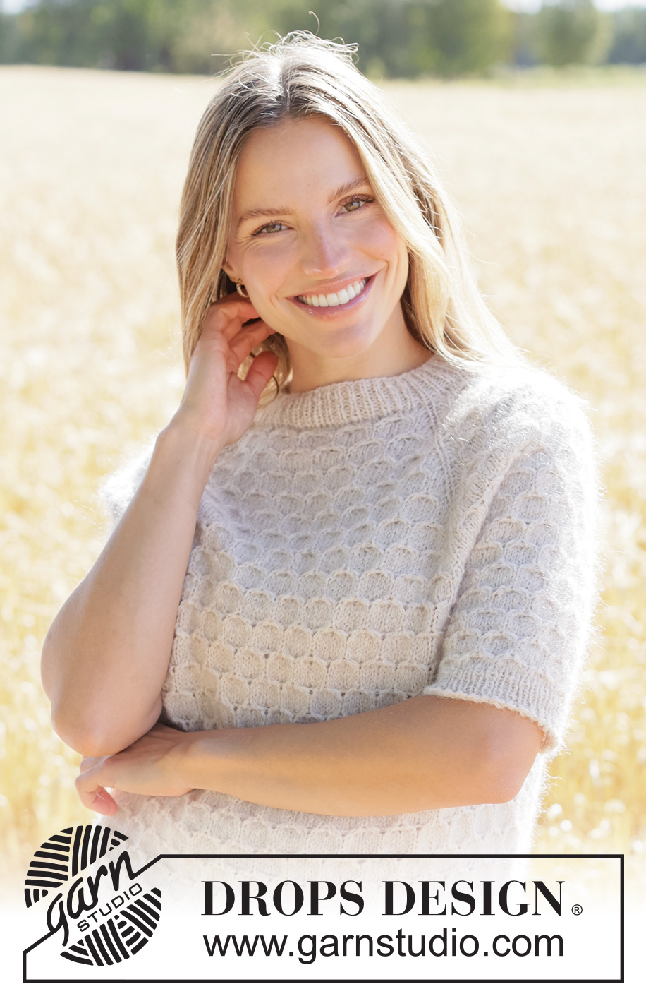 Perfectly Bee Sweater / DROPS 268-3 - Knitted sweater in DROPS Sky and DROPS Kid-Silk. The piece is worked top down with short sleeves, raglan and honeycomb pattern. Sizes XS - XXXL.