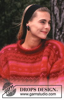 Solar Flair / DROPS 28-17 - DROPS jumper with pattern borders in “Vienna”. 