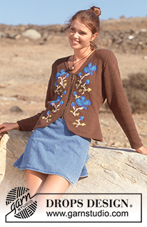 Blue Roses / DROPS 55-4 - DROPS Cardigan in Paris with flowers.