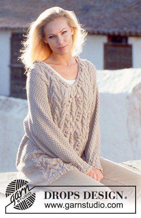 Tangled Oak / DROPS 55-8 - DROPS Sweater in Paris with Cables. 