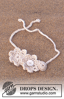Desert Bloom / DROPS 94-10 - DROPS Nostalgic poncho crochet in Alpaca and Cotton Viscose and crochet necklace and bracelet 