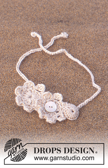 Desert Bloom / DROPS 94-10 - DROPS Nostalgic poncho crochet in Alpaca and Cotton Viscose and crochet necklace and bracelet 