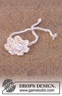 Desert Bloom / DROPS 94-10 - DROPS Nostalgic poncho crochet in Alpaca and Cotton Viscose and crochet necklace and bracelet 