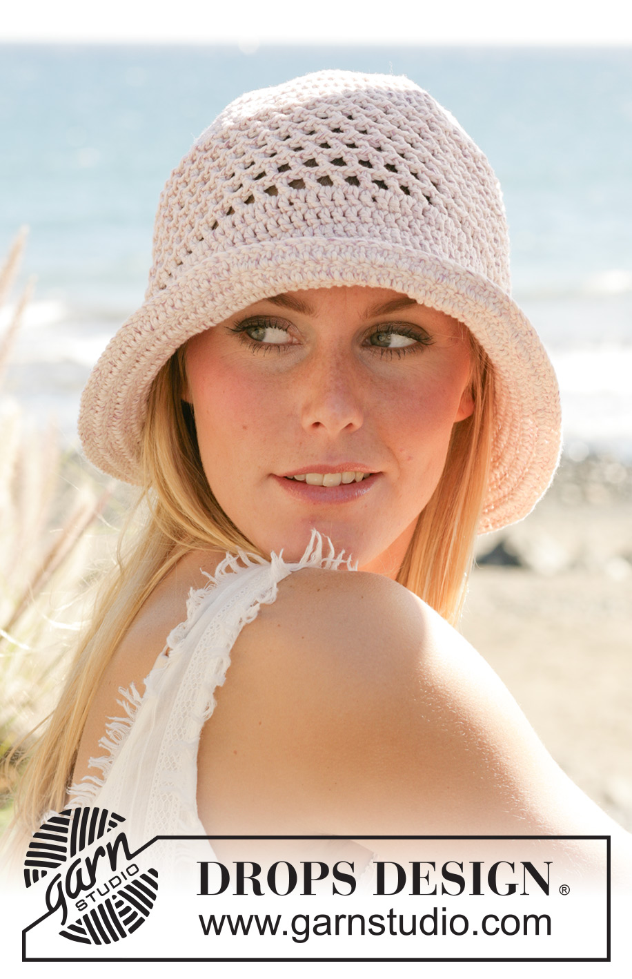 Sunny Daze / DROPS 99-23 - Heklet DROPS hatt i ”Paris”.