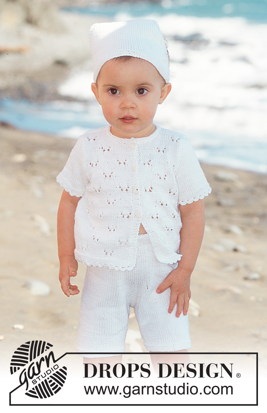 Verine / DROPS Baby 10-6 - Jacket with short sleeves, shorts and scarf in Safran