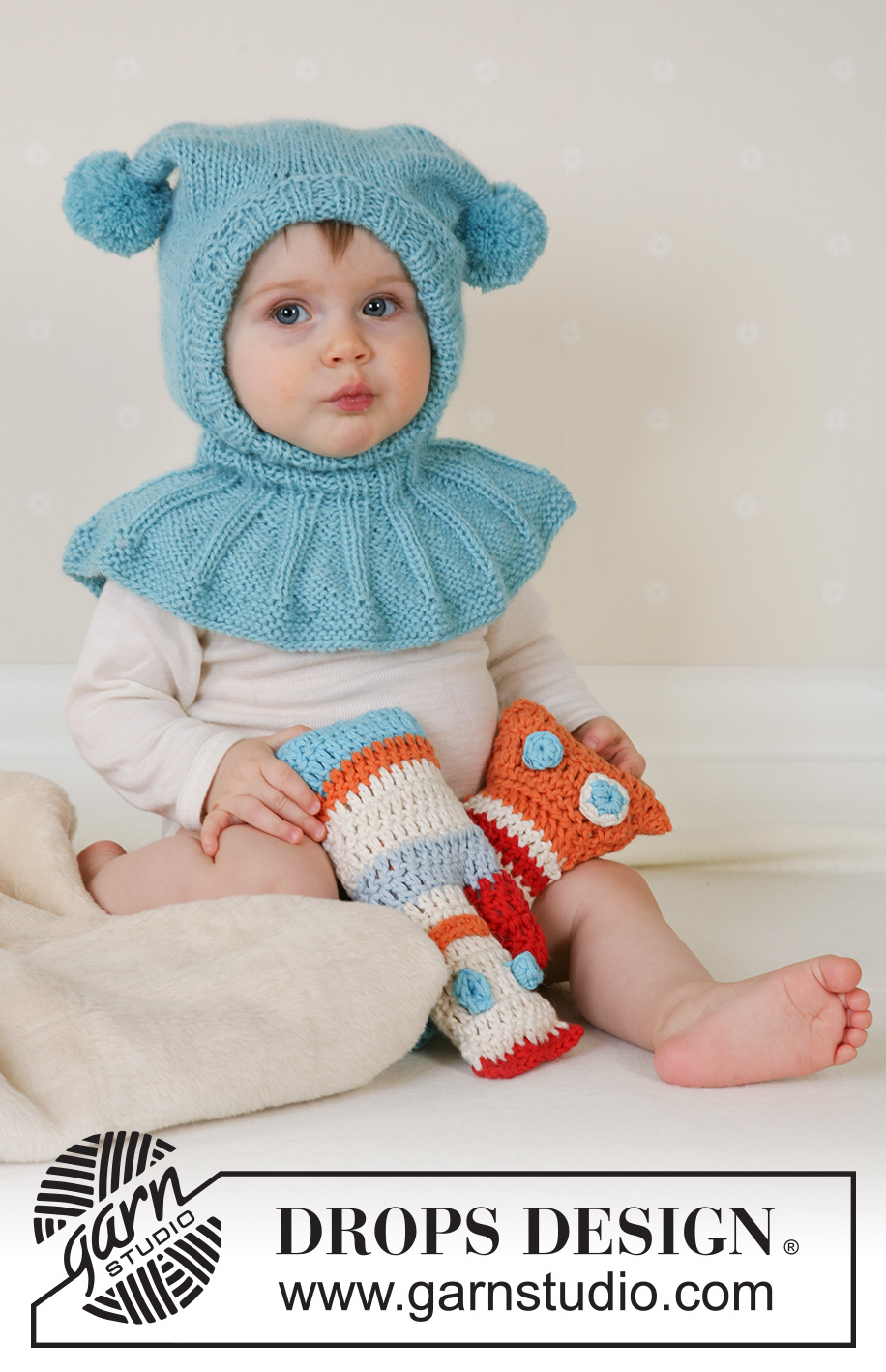 Funny Jester / DROPS Baby 14-28 - DROPS Alpaca lõngast kootud tuttidega beebi müts / laste tuukrimüts 1 kuusele kuni 4 aastasele 