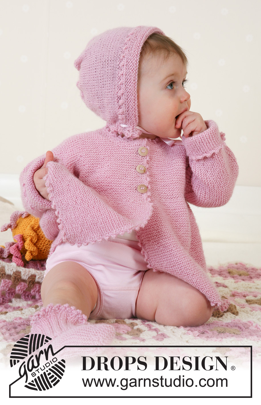 Josie Cardigan / DROPS Baby 14-7 - Knitted jacket with seamless sleeves, bonnet and socks in garter stitch in DROPS Alpaca. Sizes for baby and children, 1 month to 4 years.