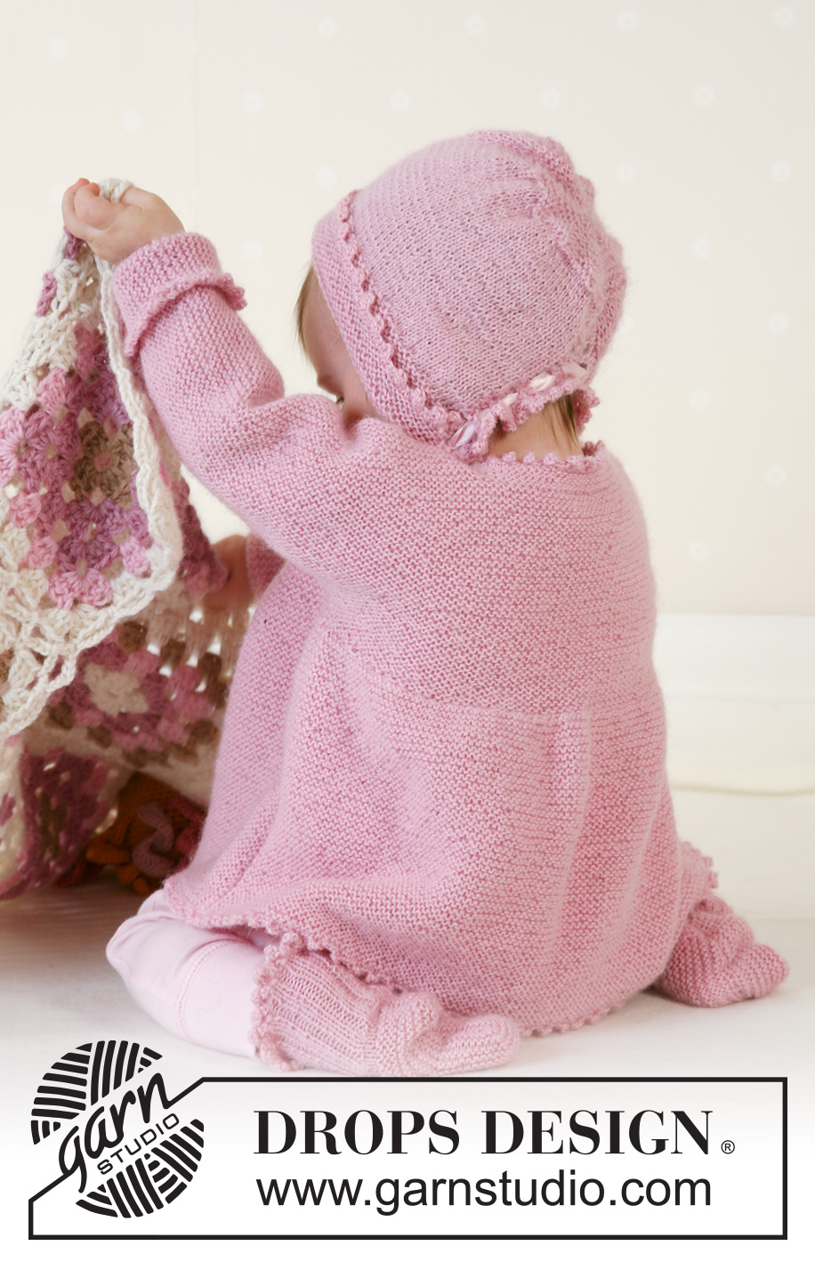 Josie Cardigan / DROPS Baby 14-7 - Knitted jacket with seamless sleeves, bonnet and socks in garter stitch in DROPS Alpaca. Sizes for baby and children, 1 month to 4 years.