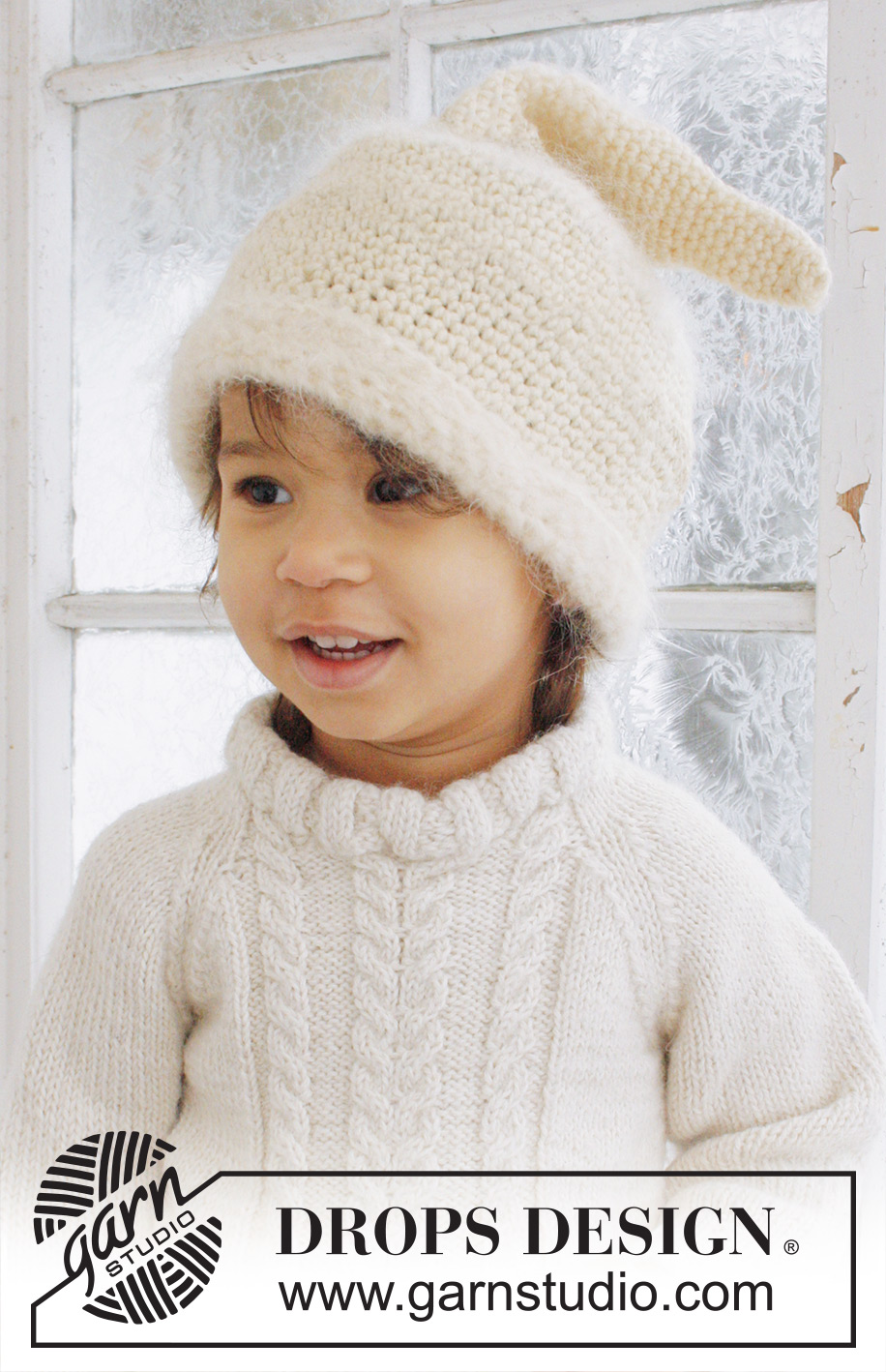 Micah / DROPS Baby 21-41 - Gehäkelte Mütze mit Zipfel / Weihnachtsmütze in DROPS Alpaca und DROPS Vienna für Babys und Kinder.