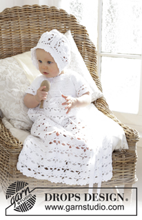 So Charming / DROPS Baby 29-3 - The baby set is made up of: Dress for Christening or special occasions, worked top down with raglan and open fan pattern in DROPS Safran. Crochet hat with flower squares and fan edge in DROPS Safran. Sizes 0 - 2 years.