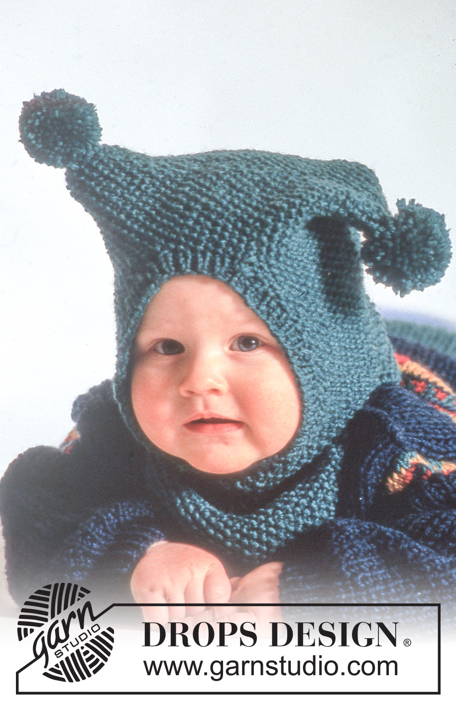 Polichinelle / DROPS Baby 3-14 - DROPS trui met sterpatroon, broek, slofjes en muts / balaclava met pompoms van “Karisma”.