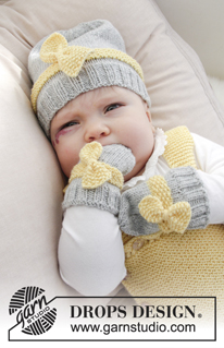 Little Miss Ribbons / DROPS Baby 31-11 - Conjunto de punto con gorro y manoplas para bebé en DROPS BabyMerino. El conjunto está tejido con punto de arroz y lazo. Tallas conjunto completo: 1 – 9 meses. Tallas gorro: prematuro – 4 años.
