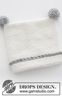 Time for Fun / DROPS Baby 31-15 - Conjunto que consiste de: Mono de punto para bebé en punto musgo con orilla a ganchillo, gorro en punto musgo con orilla a ganchillo y pompones, y calcetines. Tallas prematuro – 4 años. El conjunto está tejido en DROPS BabyMerino.
