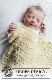 Sunrise / DROPS Baby 33-16 - Vauvan neulottu peitto DROPS BabyMerino -langasta. Työssä on pitsineuletta. Teema: Vauvanpeitto