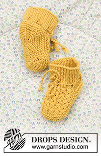 Stroll in the Park Booties / DROPS Baby 33-27 - Knitted slippers for babies with false cables in DROPS BabyMerino. Sizes Premature - 4 years.