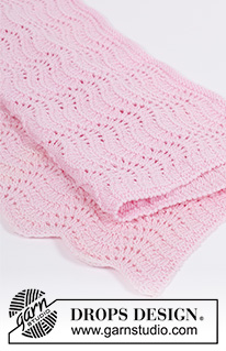 Good Night / DROPS Baby 33-4 - Gestrickte Decke für Babys in DROPS BabyMerino. Die Arbeit wird mit Wellenmuster gestrickt. Thema: Babydecke