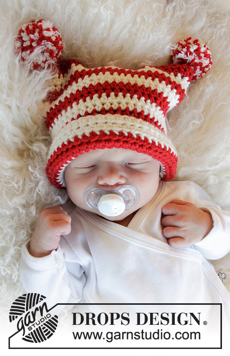 Tiny Elf / DROPS Baby 33-5 - Gehäkelte Mütze für Babys in DROPS Merino Extra Fine. Die Arbeit wird gehäkelt mit Streifen und Pompons. Größe Frühchen - 4 Jahre.